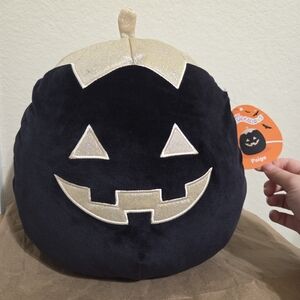 Squishmallows Gold and Black Stuffed Animal